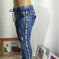 Джинси для дівчинки з рванкою і смужкою Love