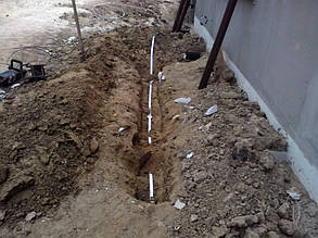 Переход токотвода на стену