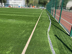 Укладка синтетической травы на школьном стадионе, г. Одесса 12