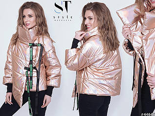 Стильна блискуча осінка жіноча куртка на застібках стрічках на металевих фастексах