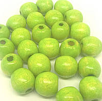 Дерев'яні намистини 13мм (100шт в упаковці) світло-салатового кольору