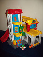 Розвиваюча іграшка Fisher Price гараж c машинками