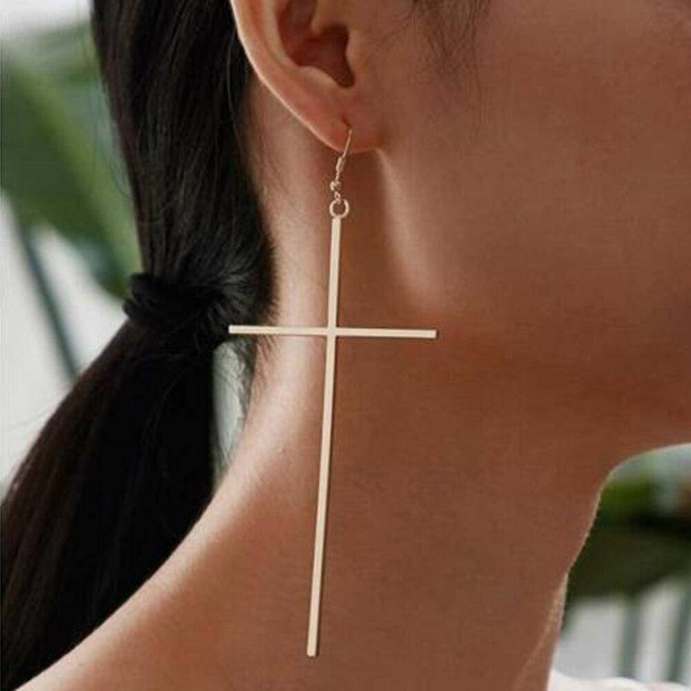 

Золотистые серьги кресты