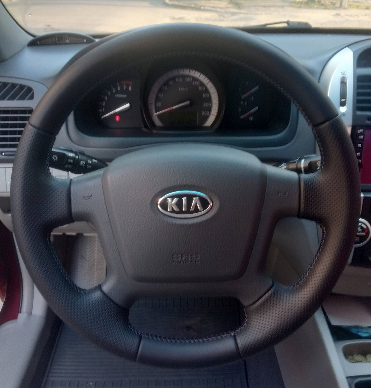 

Чехол - Оплетка из натуральной кожи на руль Kia Cerato