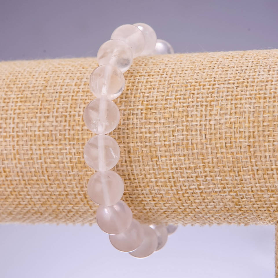 

Браслет из натурального камня Белый кварц гладкий шарик d-10мм на резинке обхват 18см