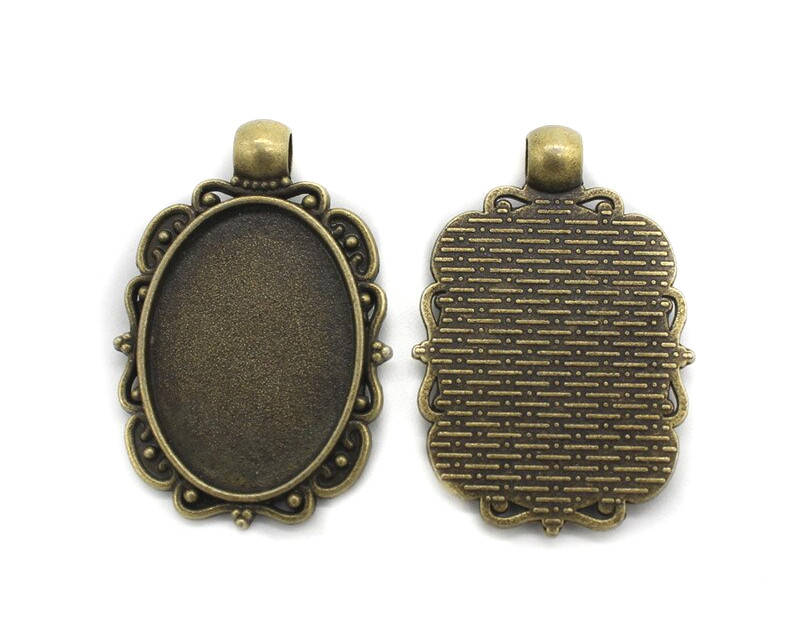 

Основа сеттинг для кулона под кабошон овальный Бронза 36х25 мм кабошон 25х18 мм