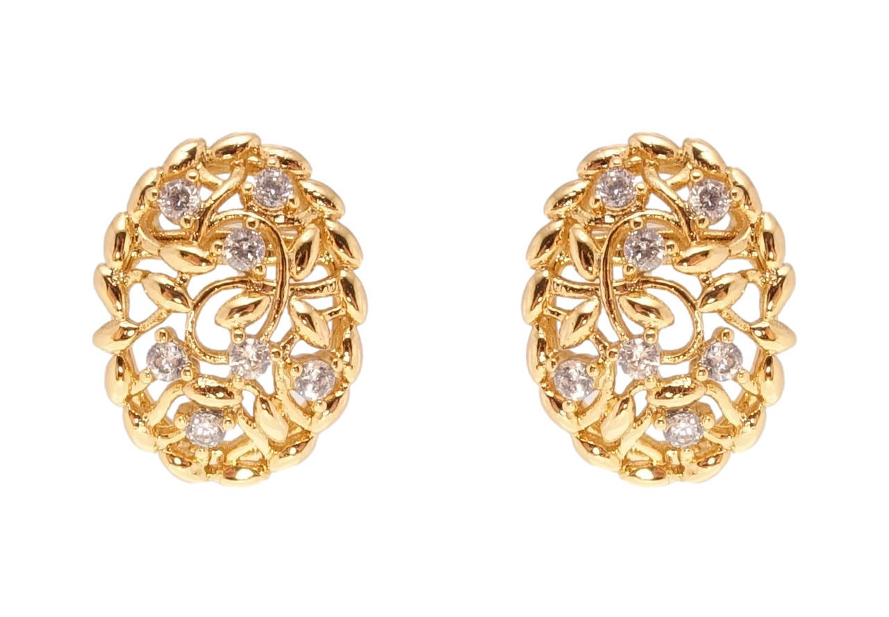 

Серьги Xuping Позолота 18K гвоздики (пусеты) "Овалы с флористическим орнаментом и вставками циркония"