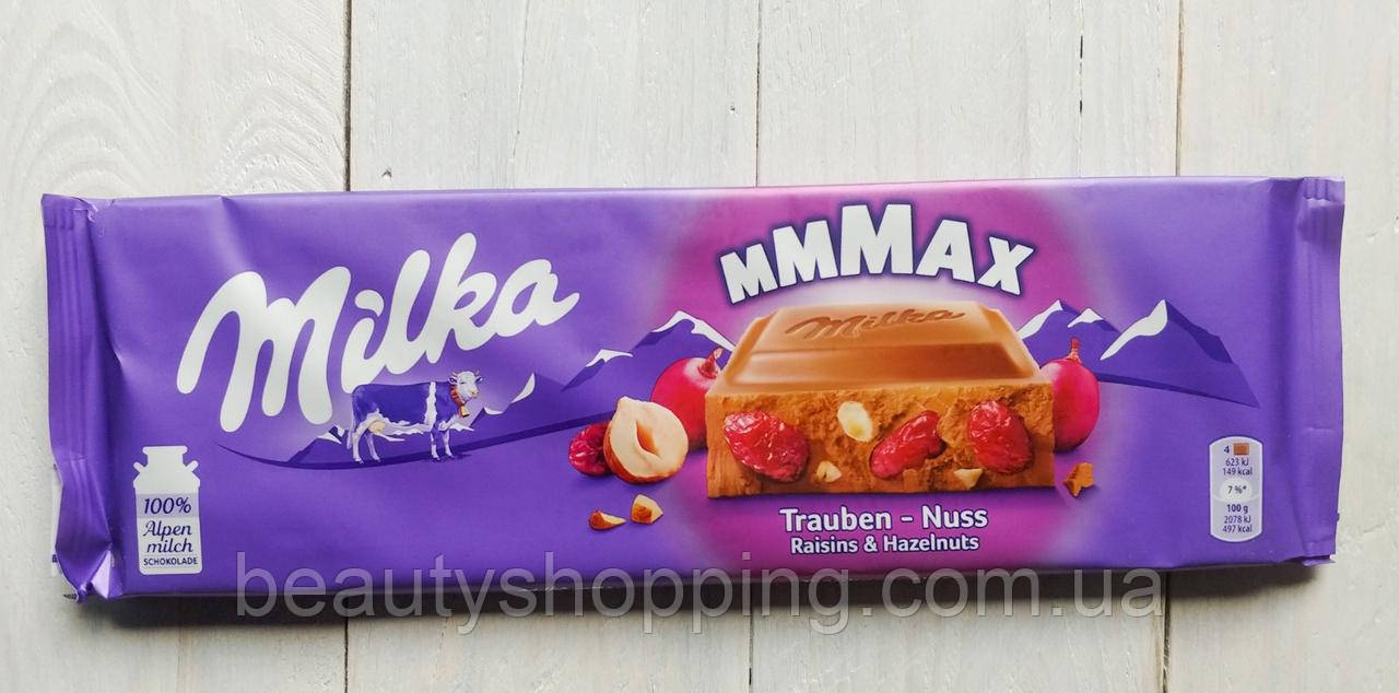 Шоколад Milka Trauben Nuss молочний шоколад із горіхами та родзинками 270g Швейцарія