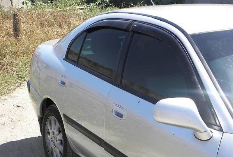 Дефлектори вікон (вітровики) Mitsubishi Carisma hb 1995-2004 (Мітсубісі Каризма) M42095