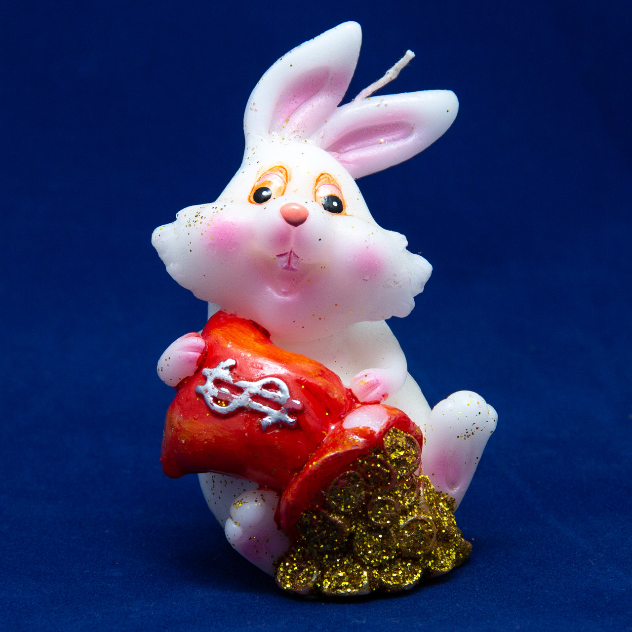 Свічка - Кролик з мішка висипає монети, 7,6 см, білий з золотистим, парафін (440160-2)