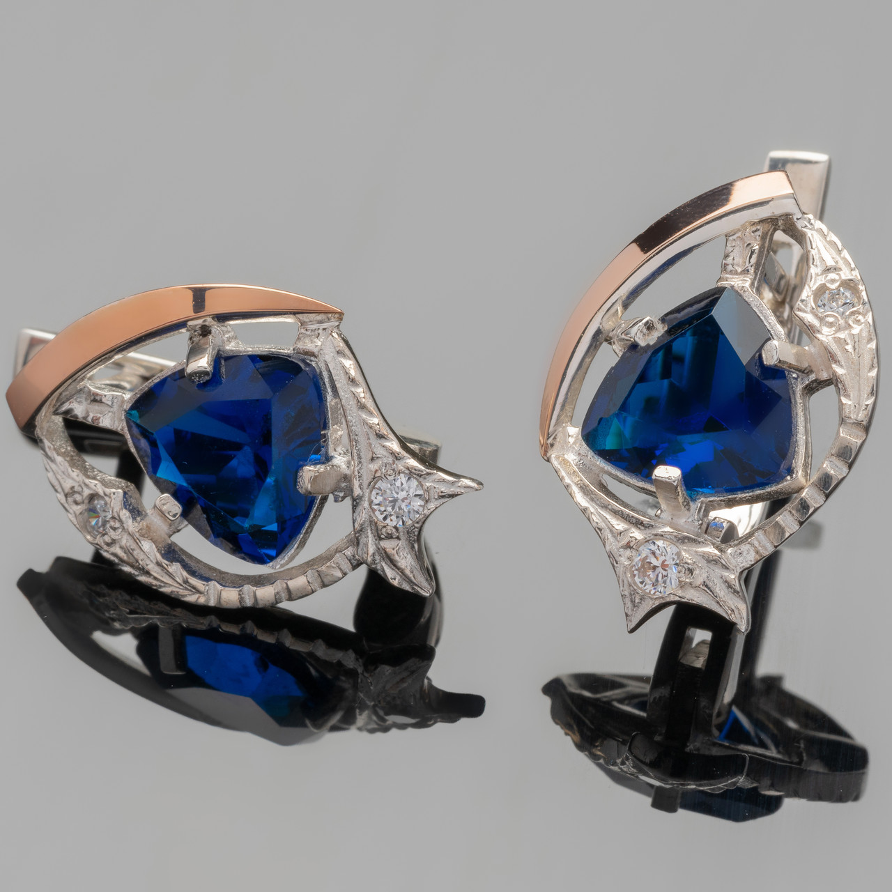 Серебряные серьги 925 пробы с золотыми вставками арт. 423с