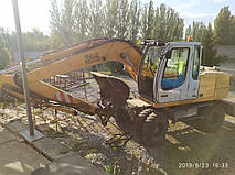 Производство и замена лобового стекла триплекс на экскаваторе Liebherr 314  в Никополе (Украина). 2