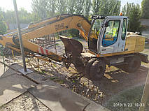 Производство и замена лобового стекла триплекс на экскаваторе Liebherr 314  в Никополе (Украина). 5