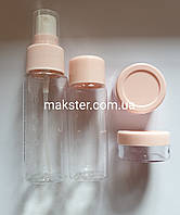 Дорожній набір флаконів і баночок для косметики 4 ємності в прозорій косметичці Рожевий