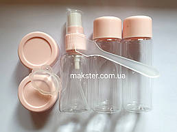 Дорожній набір ємностей для косметики 7 предметів в прозорій косметичці Рожевий