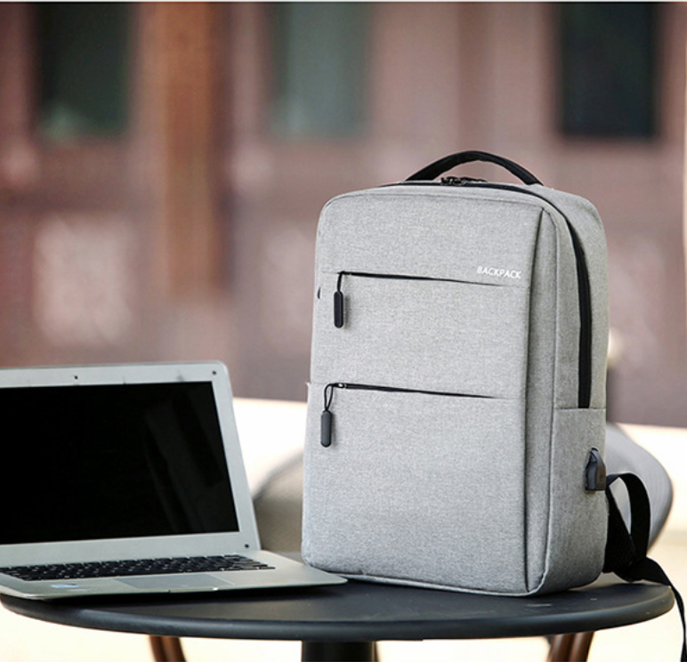 Рюкзак городской серый унисекс с USB непромокаемый с карманом для ноутбука для мужчин и женщин тканевый - фото 1 - id-p1067071452