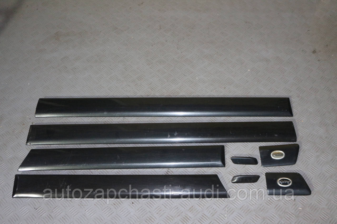 Оригінальний молдинг дверей (чорний) Audi 100 A6 C4 91-97г, фото 1