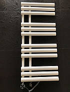 Білі рушникосушки Arttidesign: яскравий акцент в дизайні ванної кімнати