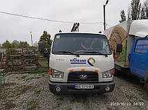 Производство и замена лобового стекла триплекс на грузовике Hyundai hd 65  в Никополе (Украина). 1