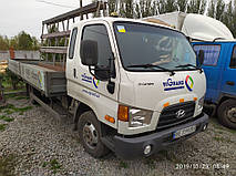 Производство и замена лобового стекла триплекс на грузовике Hyundai hd 65  в Никополе (Украина). 2