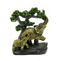 Сувенірна фігурка слони під деревом