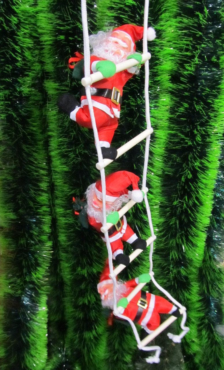 Декоративний Дід Мороз на сходах 3 фігурки по 30 см