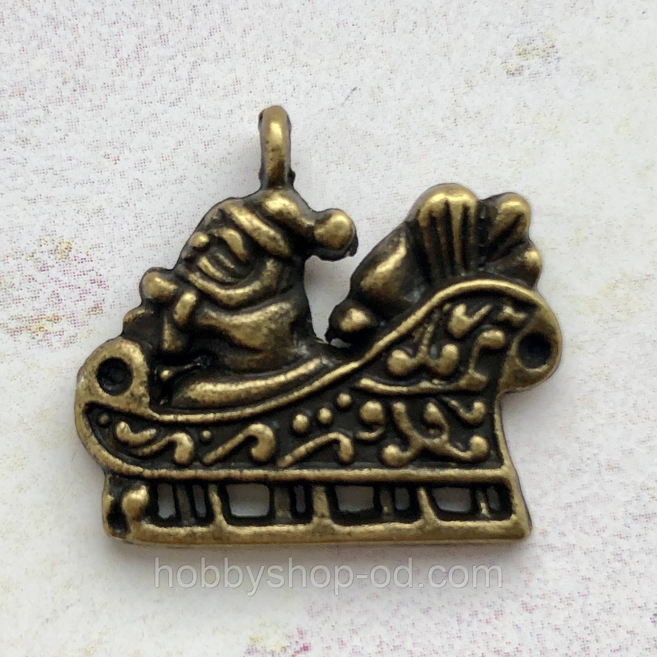 Метал. підвіска "Дід Мороз у санках" бронза 
 (2,3х2 см) 5 шт. в уп., фото 1