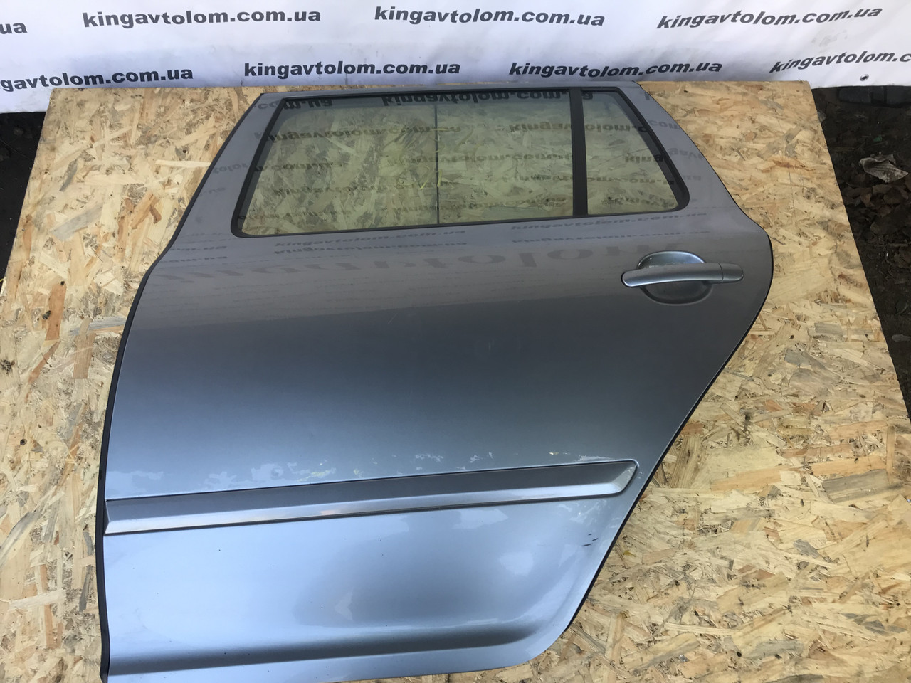 Двері задня ліва Skoda Octavia A5