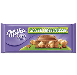 Milka Ganze Haselnüsse Молочний шоколад із цільним фундуком 300g