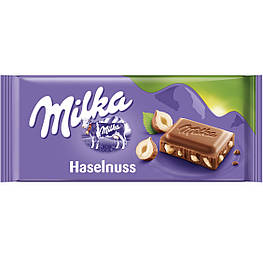 Milka Haselnuss Молочний шоколад із подрібненим фундуком 100g
