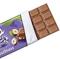 Milka Haselnuss Молочний шоколад із подрібненим фундуком 100g, фото 2