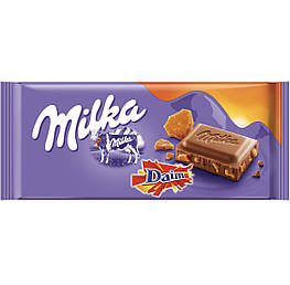 Milka&Daim Молочний шоколад зі шматочками солоної карамелі