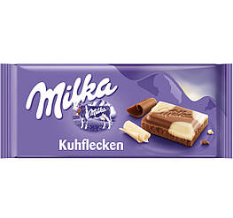 Milka Kuhflecken Молочний і білий шоколад 100g