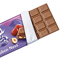 Milka Trauben-Nuss Молочний шоколад із родзинками та дробленим фундуком 100g, фото 2