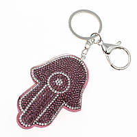 Брелок м'якого сріблястого кольору рука з білими та рожевими кристаликами розмір 7,5х5,5 см