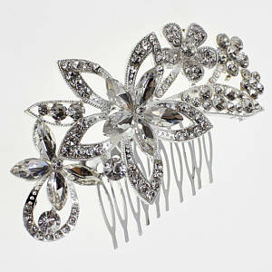 Гребінець для волосся сріблястий металевий у стразах велика квітка з листочками розмір 11х5 см на 10 зубців