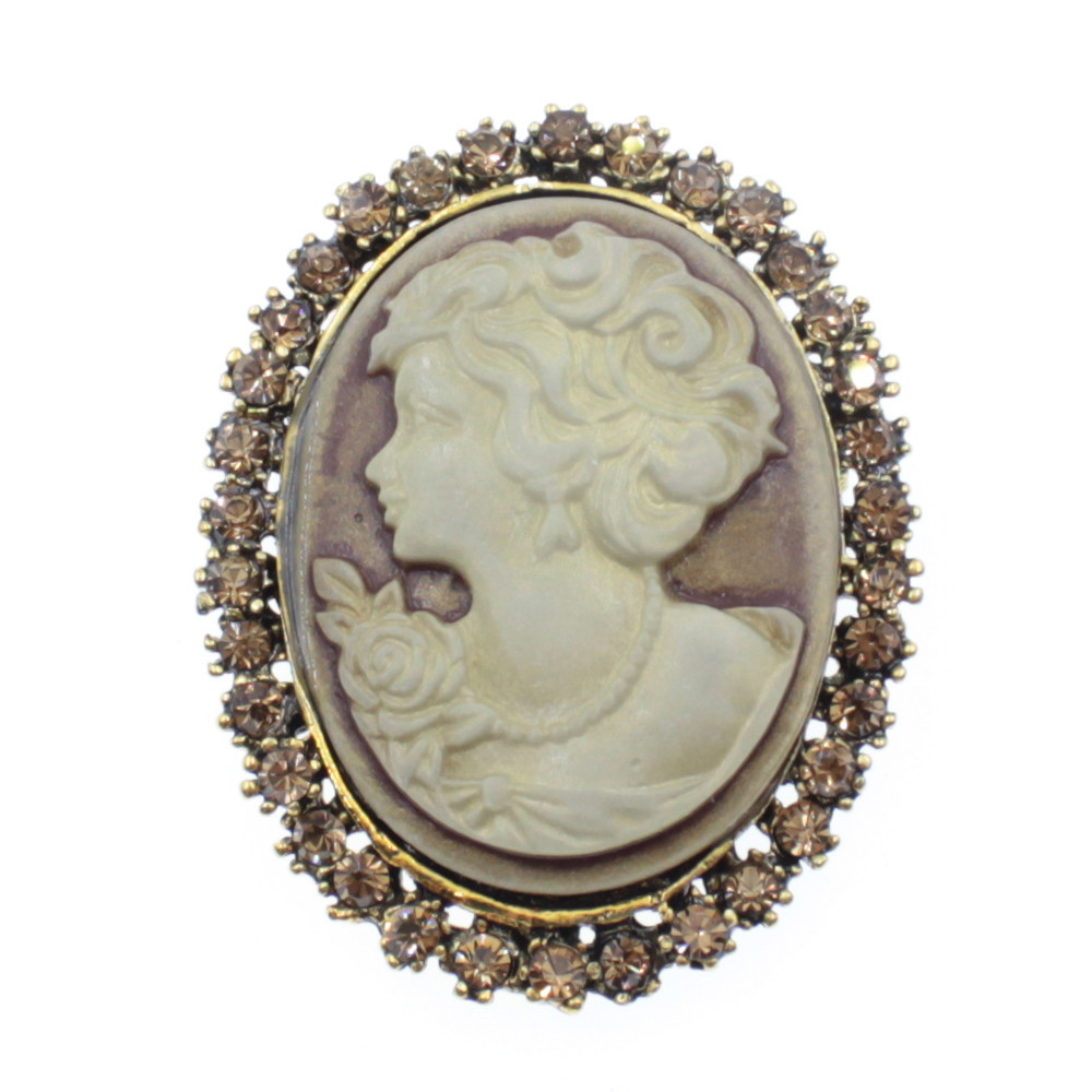 Брошка металева на золотистій основі Камеї з жовтими кришталевими кристалами розмір виробу 50х40 мм