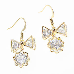 Сережки жіночі застібка петля золотистого кольору висувки бантики з квіточками з кристалами розмір 3 см