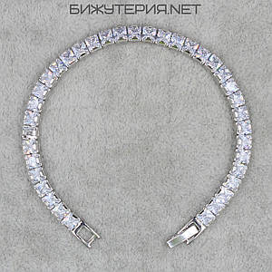Браслет жіночий вузький м'який сріблястий із білими кристалами, що переливаються, довжина 18 см ширина 5 мм