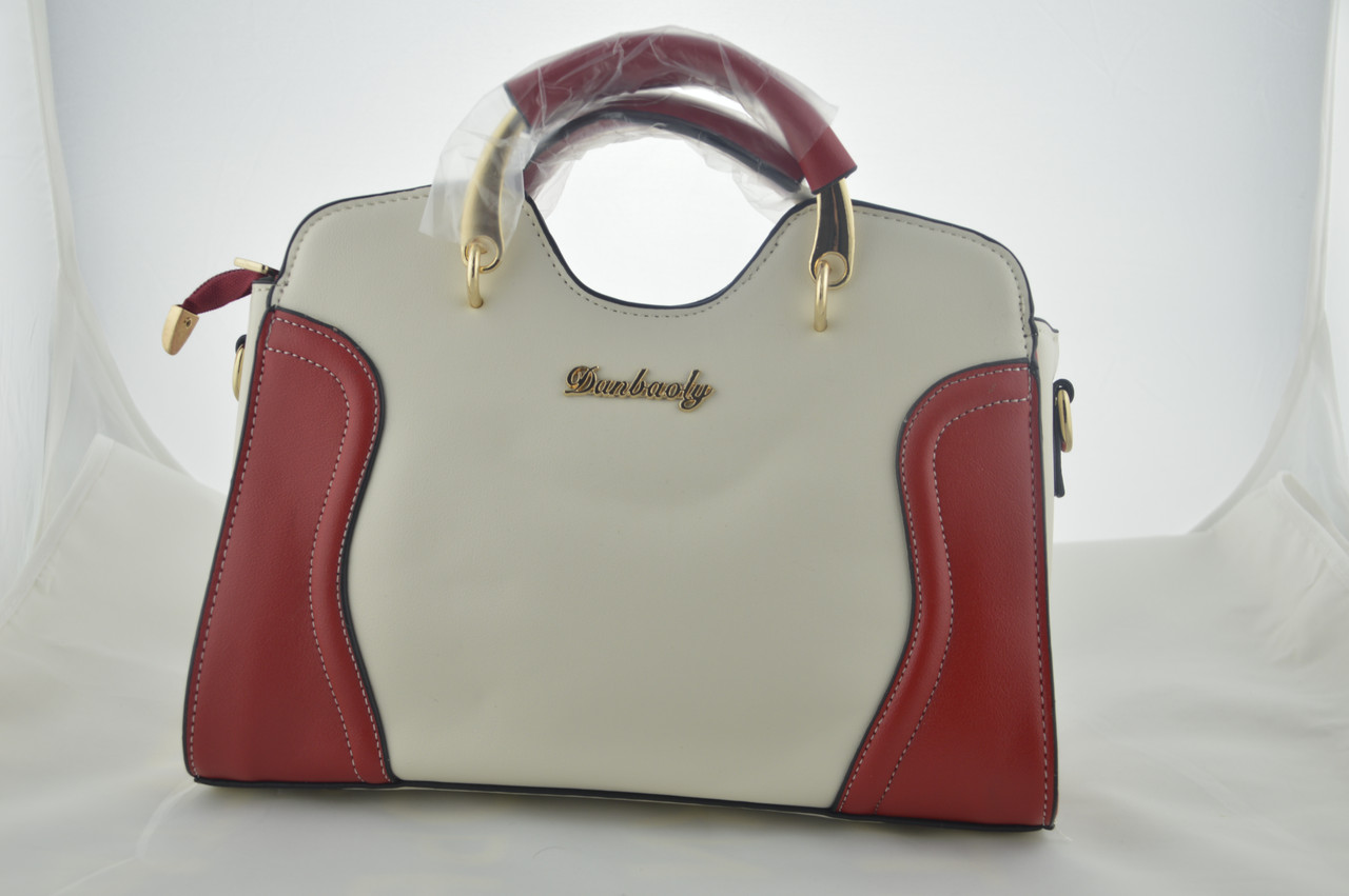 Біла жіноча сумка з червоними вставками екошкіра
