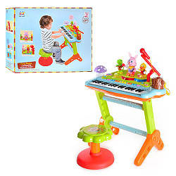 Дитячий синтезатор 669 зі стільчиком 37 клавіш музика світло-мікрофон