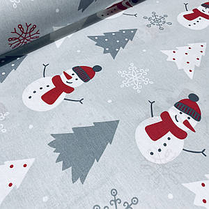 Бавовняна тканина (ТУРЦІЯ шир. 2,4 м) сніговики білі в червоних шапках і ялинки сірі на світло-сірому