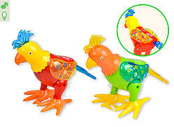 Музыкальная развивающая игрушка животное 2068 Попугай, 2 цвета, свет,звук, движение, в кор 22*17*25см