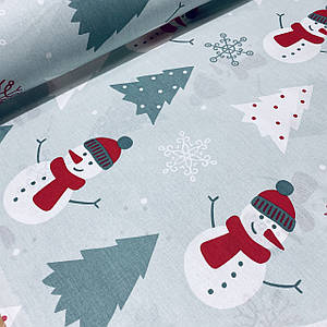Бавовняна тканина (ТУРЦІЯ шир. 2,4 м) сніговики білі в червоних шапках і ялинки сірі на світло-м'ятному