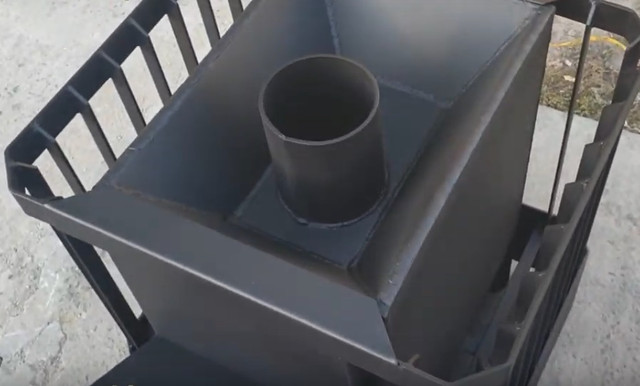 Відмінні риси в дизайні печі для лазні Ребро 30м3 з виносом