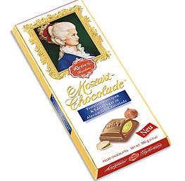 Reber Mozart Chocolade Шоколадка из молочного шоколаду с фісташковим марципаном и горіховою начинкою 100g