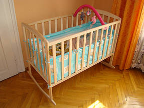 Детская деревянная кроватка на бегунах (массив Бука)