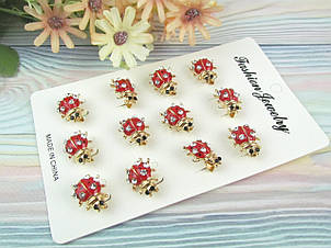 Брожка маленька Божа корівка 2*1.5 см у стразах 12 шт/уп