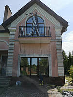 Мийка фасадів