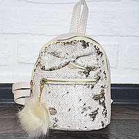 Біломовний молодіжний жіночий рюкзак із біло-сріблястими паєтками, з помпоном і бантиком